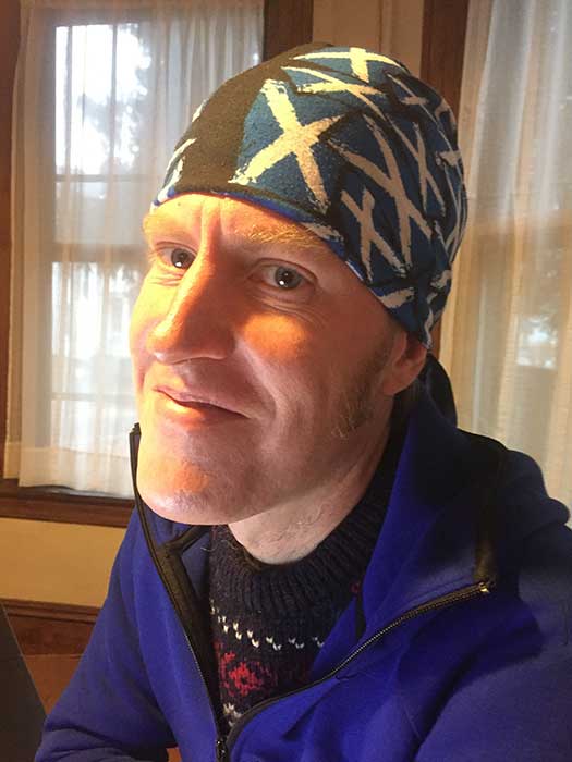 David Sloan wearing a blue bandana with Saint Andrew's cross.